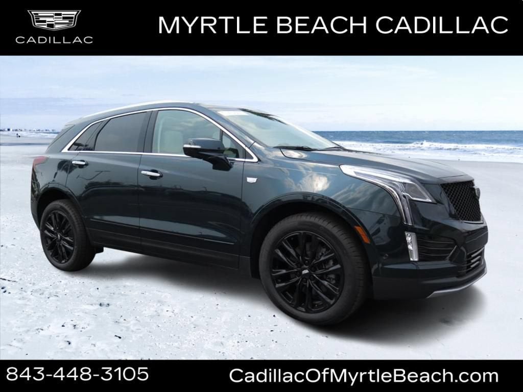 2026 Cadillac XT5 Premium Luxury in Emerald Lake Metallic — front three-quarter view