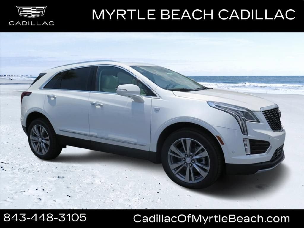 2026 Cadillac XT5 Premium Luxury in Crystal White Tricoat — front three-quarter view