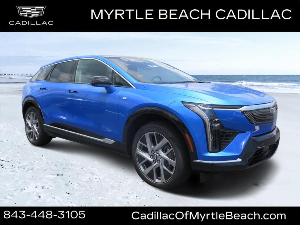 2026 Cadillac OPTIQ Premium Luxury in Coastal Blue Metallic — front three-quarter view